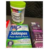 Assorted Health and Wellness Products Including Supplements, Pain Relief, and Personal Care