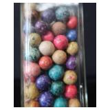 VINTAGE JAR FILLED WITH CLAY MARBLES