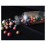 VINTAGE JAR FILLED WITH CLAY MARBLES