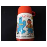 2 VINTAGE LUNCHBOXES AND 1 THERMOS.