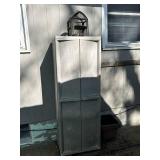 Outdoor Storage Cabinet with Contents and Decorative Birdcage