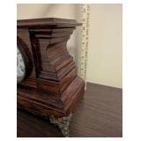 Antique Wooden Mantel Clock with Roman Numeral Dial and Metal Feet