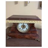 Antique Wooden Mantel Clock with Roman Numeral Dial and Metal Feet
