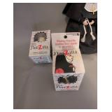 Collection of Nun Figurines, Nun Dolls, and Nunzilla Windup Toys