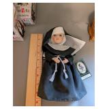 Collection of Nun Figurines, Nun Dolls, and Nunzilla Windup Toys