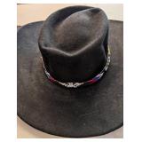 Assorted Black Hats Including Witch Hats, Cowboy Hats, and Greek Fisherman Cap