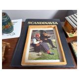 Scandinavian Decor Collection with Book, Figurines, and Folk Art Pottery