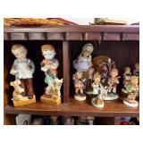 Collection of Hummel and Style Porcelain Figurines with Miniature Art Plaques
