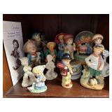Collection of Goebel Hummel Figurines with Display Stand