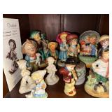 Collection of Goebel Hummel Figurines with Display Stand