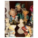Collection of Goebel Hummel Figurines with Display Stand