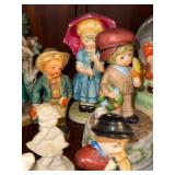 Collection of Goebel Hummel Figurines with Display Stand
