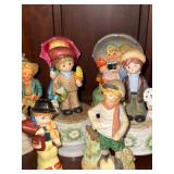 Collection of Goebel Hummel Figurines with Display Stand