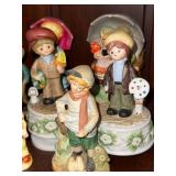 Collection of Goebel Hummel Figurines with Display Stand