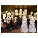 Collection of Nun and Madonna Ceramic Figurines