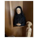 Collection of Religious Figurines and Statues Featuring Nuns and Saints