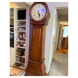 Beautiful Howard Miller 610-901 Grandfather Clock with Wood Case - Purple mark on clock face is due to lighting, not a flaw.