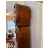 Beautiful Howard Miller 610-901 Grandfather Clock with Wood Case - Purple mark on clock face is due to lighting, not a flaw.