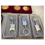 Gold Bond Stamp Books, PGA 2002 Keepsakes, Token Keychains and Grand Casino Collectible Coins Set