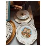 Collection of Decorative Plates, Bowls, and Framed Art with Scandinavian Motifs