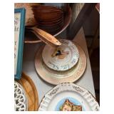 Collection of Decorative Plates, Bowls, and Framed Art with Scandinavian Motifs