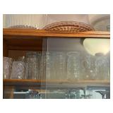 Collection of Vintage Glassware Including Tumblers, Goblets, and Serving Pieces
