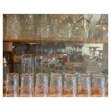 Collection of Vintage Glassware Including Tumblers, Goblets, and Serving Pieces