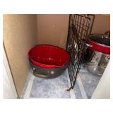 Collection of Metal Baking Racks and Red Cooking Pots with Lids