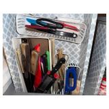 Collection of Kitchen Knives, Utensils, and Holiday-Themed Pot Holders