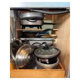Kitchen Cookware and Utensil Collection Including Pans, Lids, and Gadgets