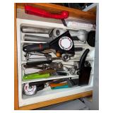 Kitchen Cookware and Utensil Collection Including Pans, Lids, and Gadgets
