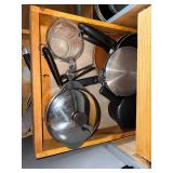 Kitchen Cookware and Utensil Collection Including Pans, Lids, and Gadgets