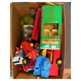 Box of Vintage Tonka Trucks, Cars, and Matchbox Tractors Assortment