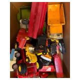 Box of Vintage Tonka Trucks, Cars, and Matchbox Tractors Assortment