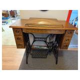 Antique Singer Treadle Sewing Machine with Ornate Wood Cabinet
