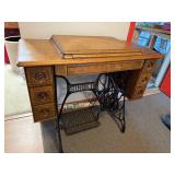 Antique Singer Treadle Sewing Machine with Ornate Wood Cabinet
