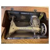 Antique Singer Treadle Sewing Machine with Ornate Wood Cabinet