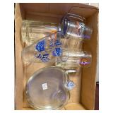 Collection of Glass Drinkware and Serving Pieces Including Mugs, Beer Pitcher, and Apple Dish
