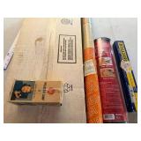 Group of Vintage Household Items Including GE Projector Lamp, Solar-X Window Film, Oven Liner, and Smorgasbord Party Game
