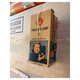 Group of Vintage Household Items Including GE Projector Lamp, Solar-X Window Film, Oven Liner, and Smorgasbord Party Game
