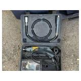 Collection of Power Tools and Hand Tools in Storage Cases