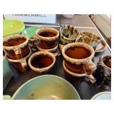 Vintage Pottery and Stoneware Dishware Collection including Mugs, Bowls, and Serving Pieces