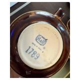 Vintage Pottery and Stoneware Dishware Collection including Mugs, Bowls, and Serving Pieces
