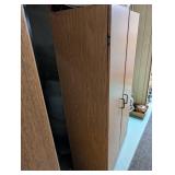 Tall Oak-Look Kitchen Storage Cabinet with Assorted Cookware and Bakeware