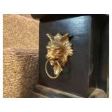 Antique Black Mantel Clock with Ornate Lion Head Details