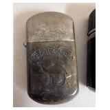 Group of 4 Vintage and Modern Lighters Including Camel, Croc Pattern, Hunter Design, and Cat Motif