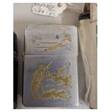 Group of 4 Vintage and Modern Lighters Including Camel, Croc Pattern, Hunter Design, and Cat Motif