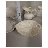Collection of Embossed White Ceramic Serving Pieces and Mugs