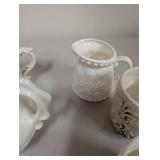 Collection of Embossed White Ceramic Serving Pieces and Mugs