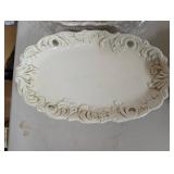 Collection of Embossed White Ceramic Serving Pieces and Mugs